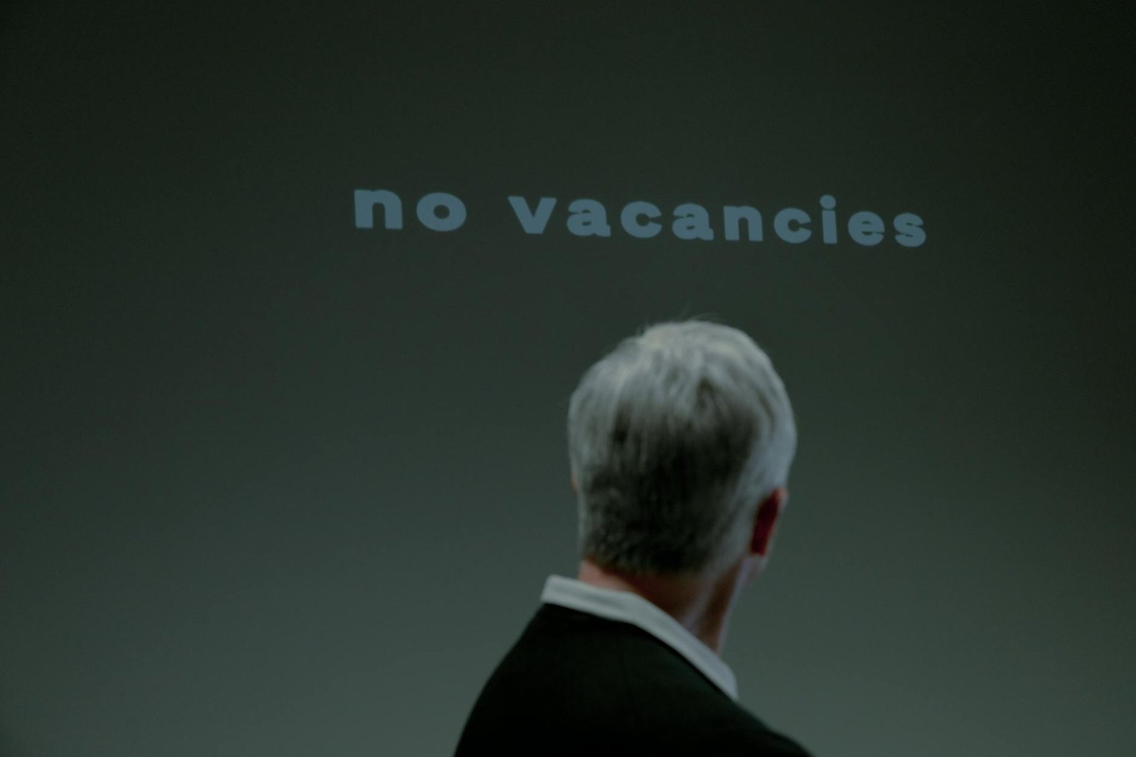 a man looking at a message